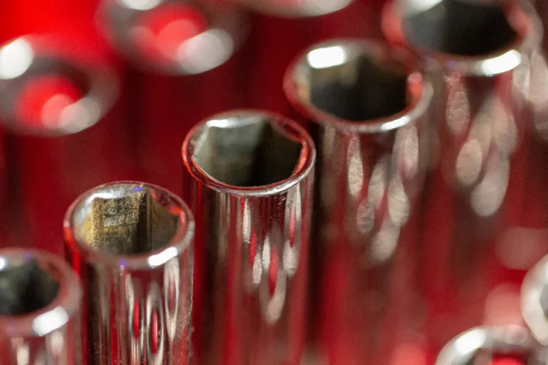 Close-up of chrome sockets from a repair tool set