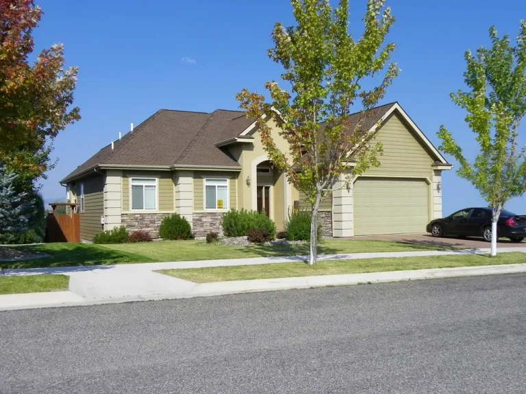Suburban house with a two-car garage on a quiet residential street