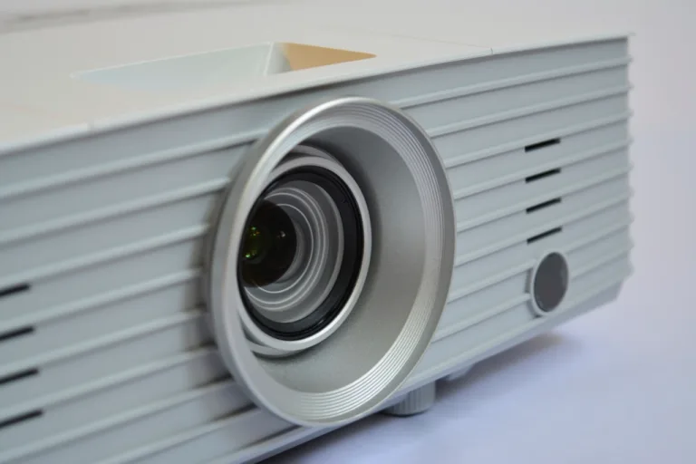 Close-up of a white video projector lens